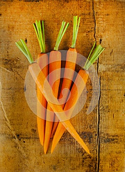 Peeled Carrots on a Rustic Wooden Table