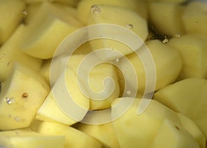 Peeled and Chopped Potatoes Underwater