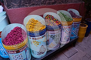 Peeled colorful flowers for room fragrance on sale in a market in a souk in the Medina around the Jemaa el-Fnaa square