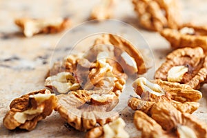 Peeled dried walnut kernels on kitchen table