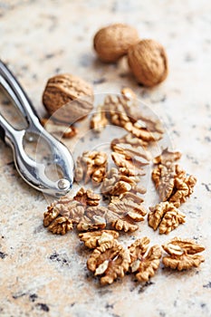 Peeled dried walnut kernels on kitchen table