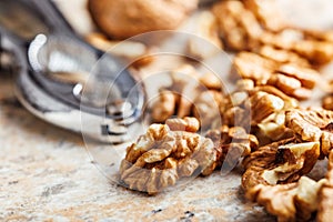 Peeled dried walnut kernels on kitchen table