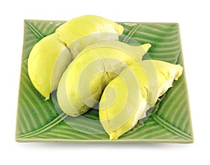 Peeled durian on green plate