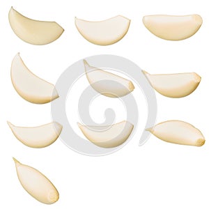 Peeled garlic cloves isolated on white background