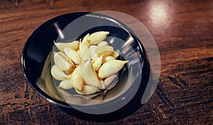 Peeled Garlic Cloves in a small Dish
