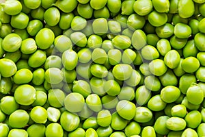 Peeled green pea background. Heap of fresh beans ready to eat.