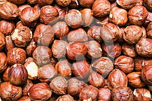 Peeled hazelnuts, cobnuts background