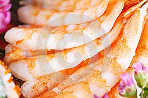 Peeled king prawns meat close-up