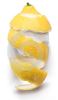 Peeled lemon and lemon zest on white background. Close-up