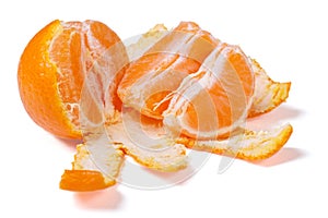 Peeled mandarin segments isolated on white background.