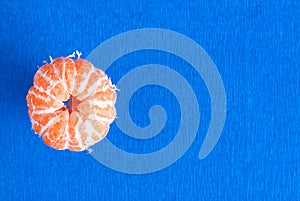 Peeled Mandarin, top view, space for text