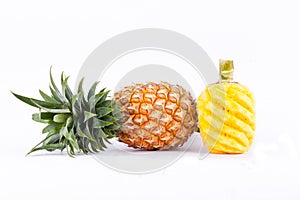 Peeled pineapple and fresh ripe pineapple on white background healthy pineapple fruit food isolated