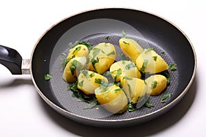 Peeled potatoes in pan