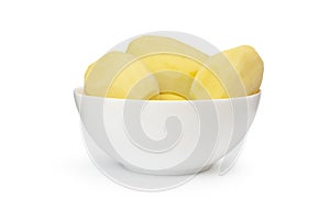 Peeled potatoes in a white bowl isolated on white background