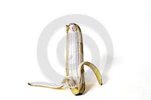 Peeled ripe banana isolated on the white background