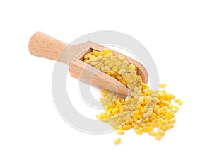 peeled split mung bean in wooden spoon isolated on white background.Ingredients for cooking Healthy and Natural Food