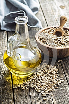 Peeled sunflower seeds and oil