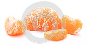 Peeled tangerine or mandarin fruit isolated on a white