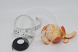 Peeled tangerine or mandarin fruit isolated on white background cutout.