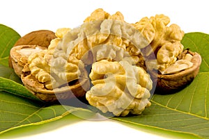 Peeled walnuts close-up. Isolate the core of leaves and shells o