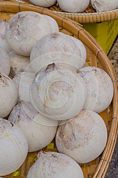 Peeled young coconuts