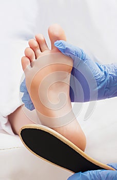 Peeling feet pedicure procedure in SPA salon