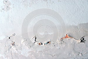 Peeling paint, indicating damp on the bathroom wall. Water Leaks