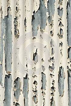 Peeling paint from metal surface