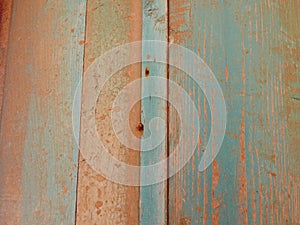 Peeling paint on an old wooden window