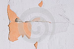 Peeling paint plaster with old weathered concrete obsolete wall cement worn texture messy background
