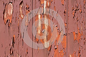 Peeling paint on red barn