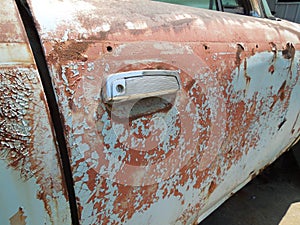 Peeling Paint on a vintage car door