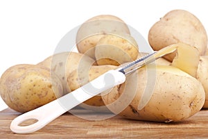 Peeling potatoes