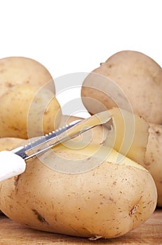 Peeling potatoes