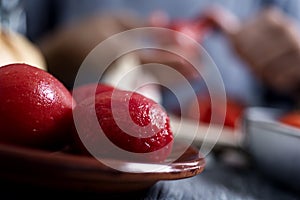 Peeling scalded tomatoes