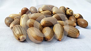 Peeloff melinjo seed on white background