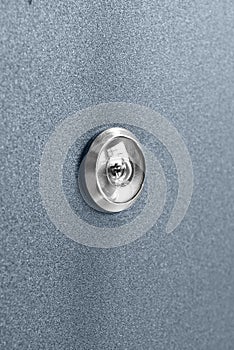 Peephole At Dark Blue Metallic Door With Lock