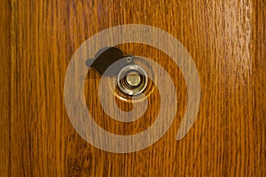 Peephole in a door.