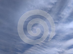 A peerless snapshot of an eye-catching view of an exquisite pattern of white clouds in blue sky in sunlight