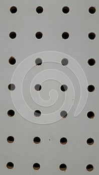 peg board holes on empty department store