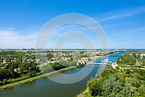 The Pegasus Bridge over the Orne Canal in the middle of the countryside in Europe, France, Normandy, towards Caen, Ranville, in