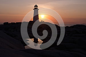 Peggy`s Cove Lighthouse at sunset