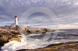 Peggy`s Cove Lighthouse at sunset