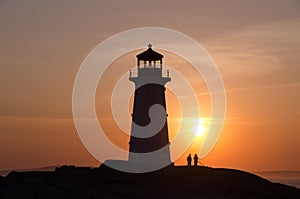 Peggy`s Cove Lighthouse at sunset