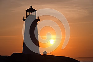 Peggy`s Cove Lighthouse at sunset