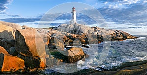 Peggy`s Cove Lighthouse at sunset photo