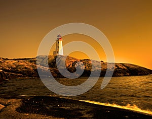 Peggy`s cove lighthouse and waves photo