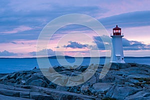 Peggy's Point Lighthouse in dramatic sunset light