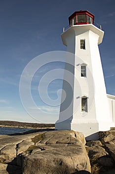 Peggys Cove Lighthouse, Nova Scotia, Canada on rocky shoreline