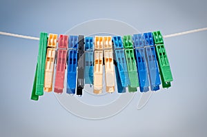 Pegs with sky in the background